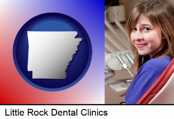 a smiling dental clinic patient in Little Rock, AR