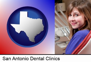 a smiling dental clinic patient in San Antonio, TX