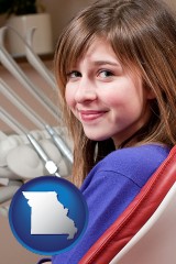 missouri map icon and a smiling dental clinic patient