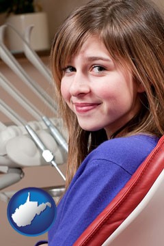 a smiling dental clinic patient - with West Virginia icon