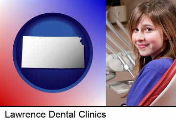 a smiling dental clinic patient in Lawrence, KS