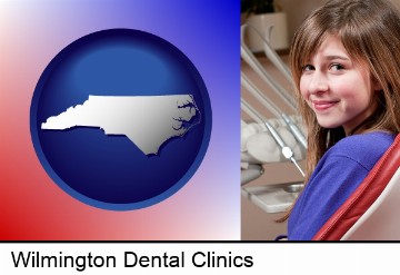 a smiling dental clinic patient in Wilmington, NC